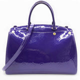 Alma Bag In Purple Embossed Monogram Patent Leather