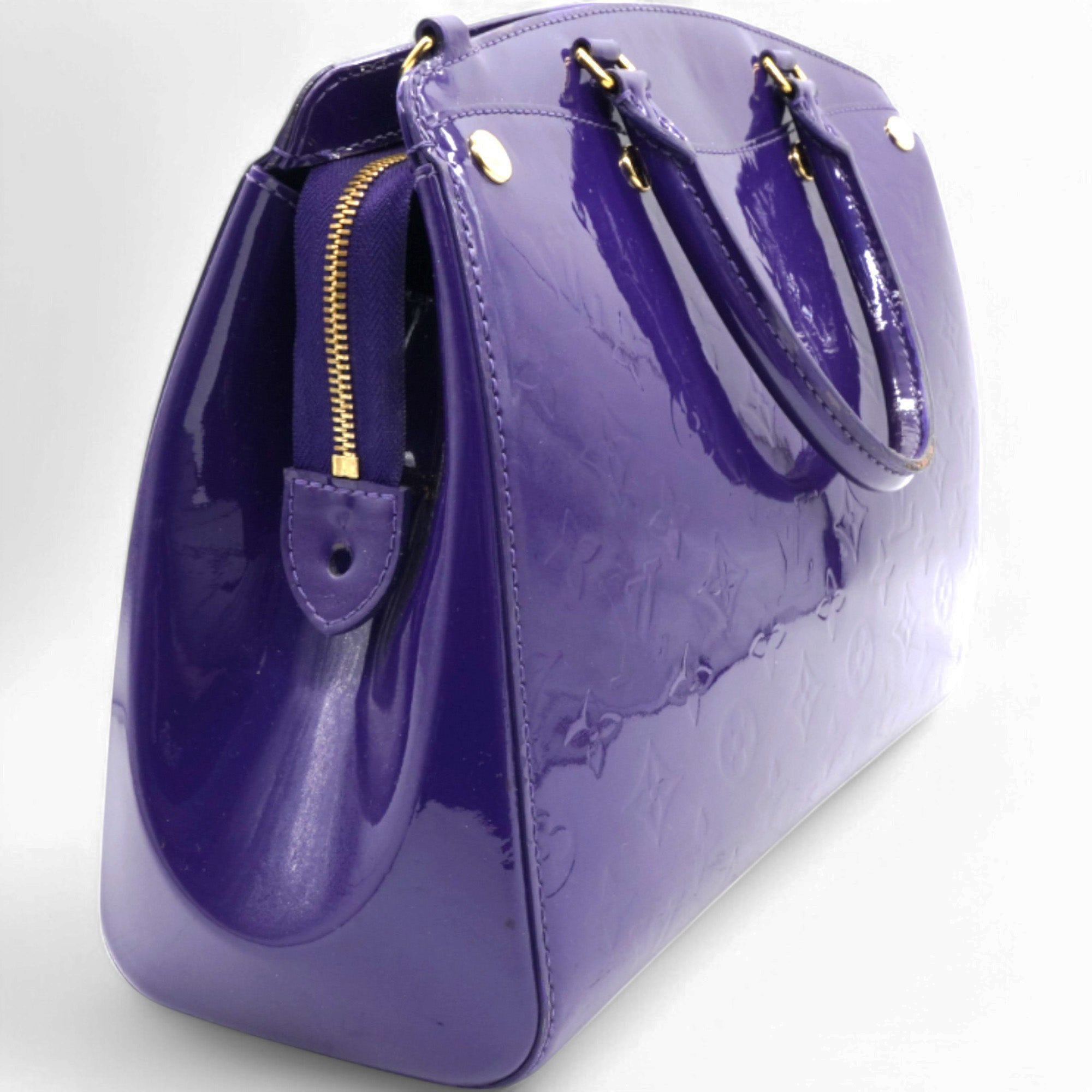 Alma Bag In Purple Embossed Monogram Patent Leather