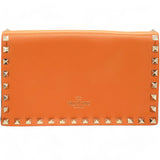 Garavani Nappa Rockstud Wristlet Clutch Camel