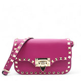 Vitello Rockstud Flap Saddle Crossbody Bag Fuxia Mini