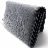 Caviar Camellia Embossed Flap Wallet Black