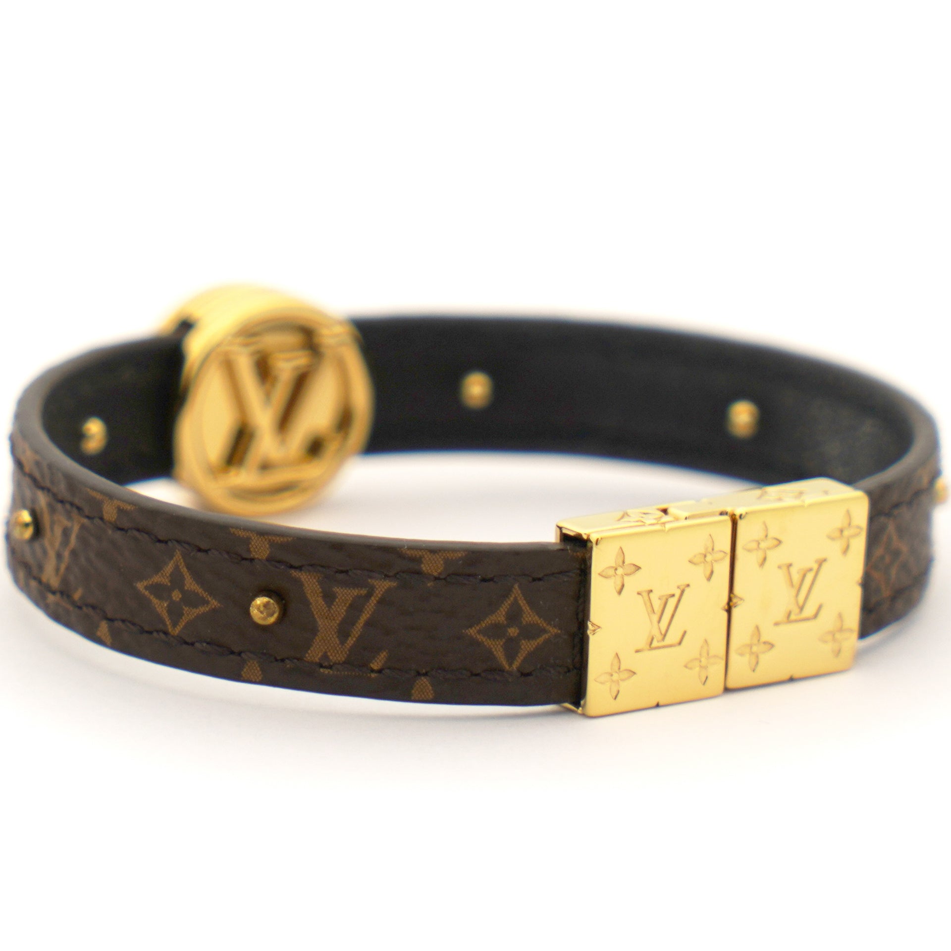 Louis Vuitton golden steel circular bracelet buckle accessory LV logo