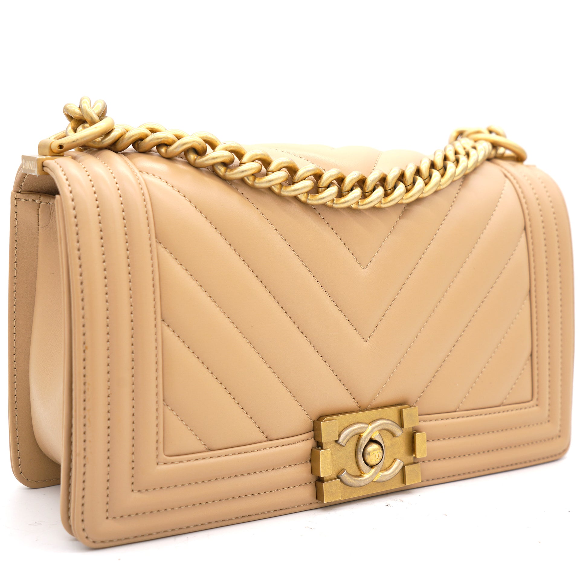 RESERVED**Chanel o-mini pouch in gold/beige tone with Boy lock 