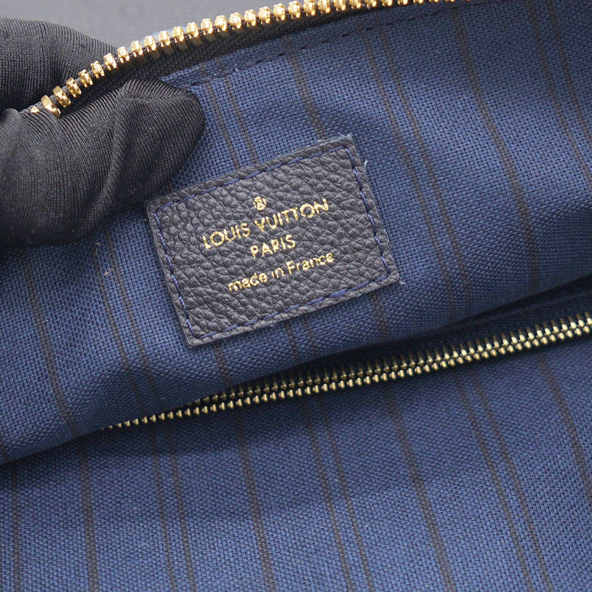 Shop authentic Louis Vuitton Monogram Empreinte Lumineuse PM at