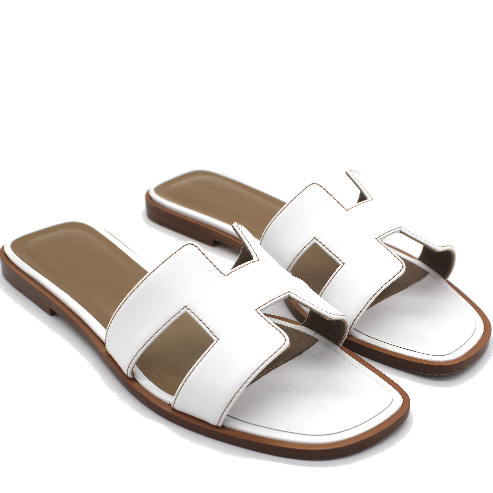 Hermes flip best sale flops white