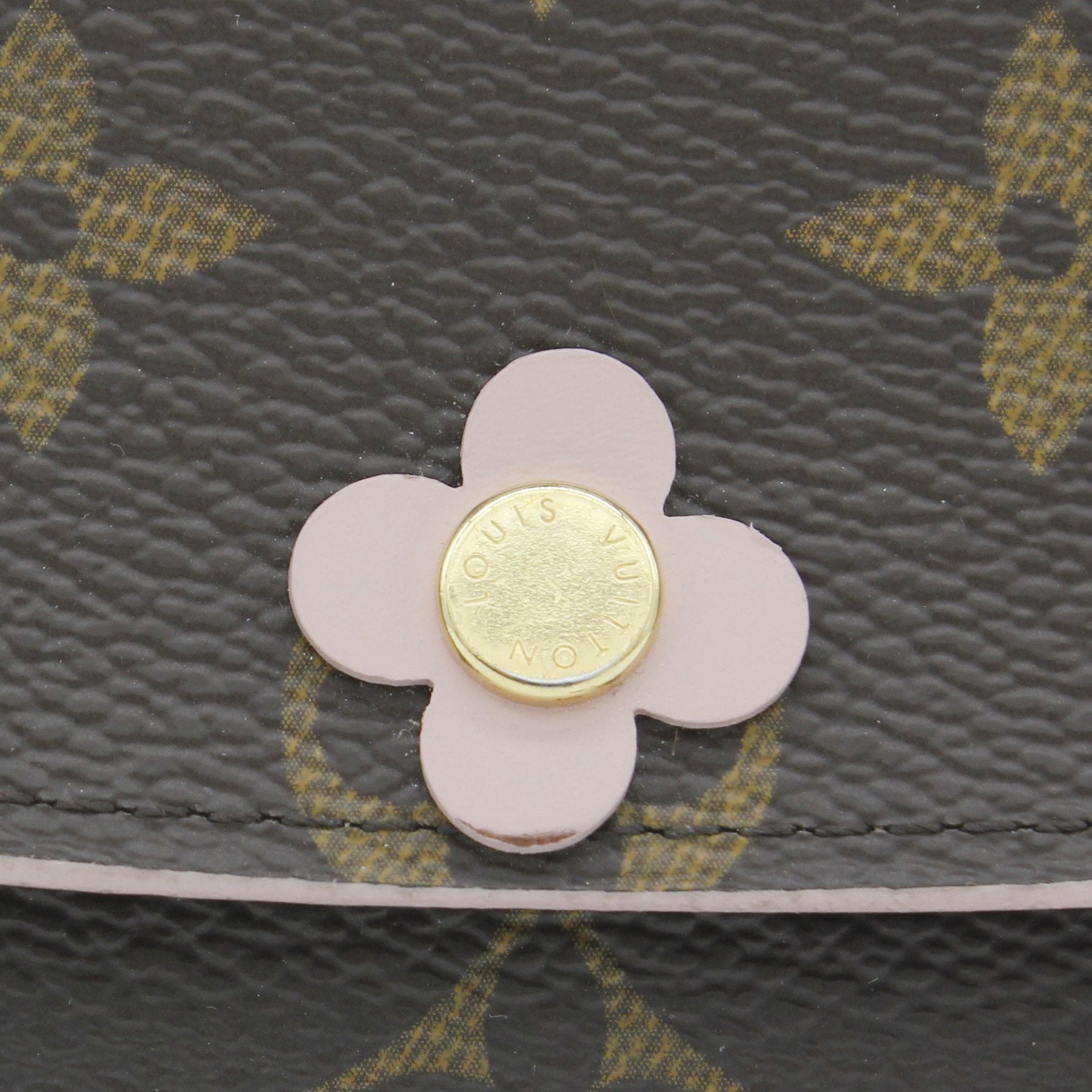 The front side of the Louis Vuitton monogram bloom flower emilie
